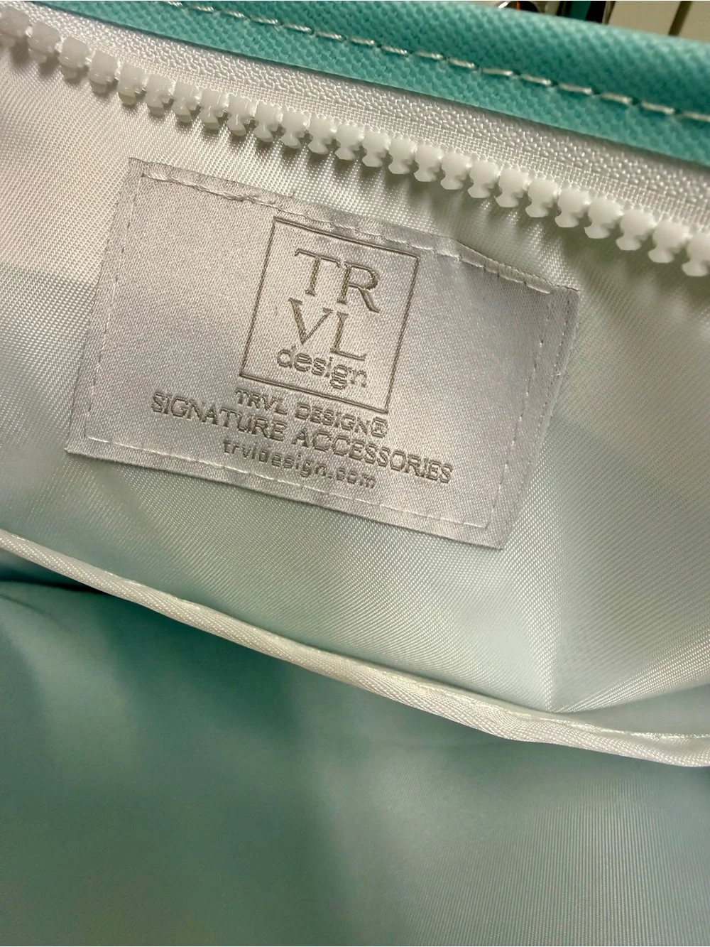 TRVL Design Turquoise Monogram Cosmetic Pouch with Decorative 'M'